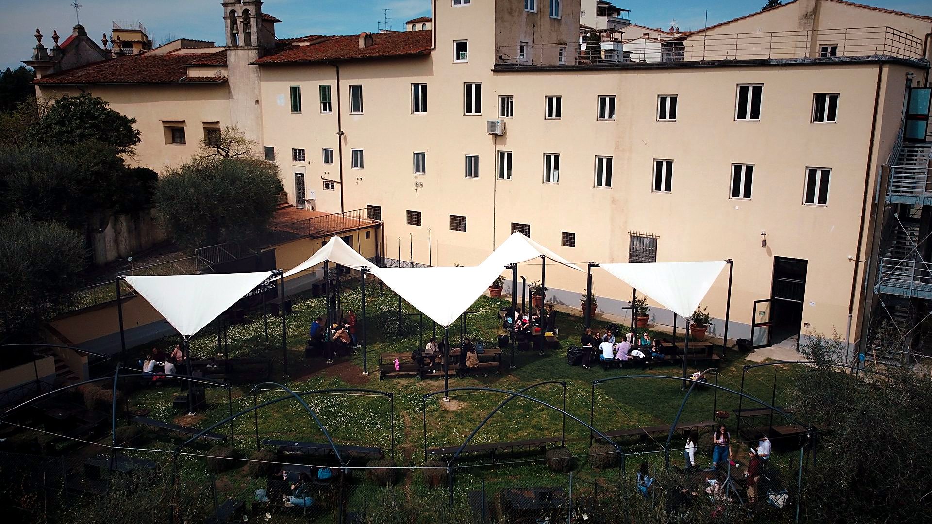 The Florence campus seen from the garden, with shaded study terraces