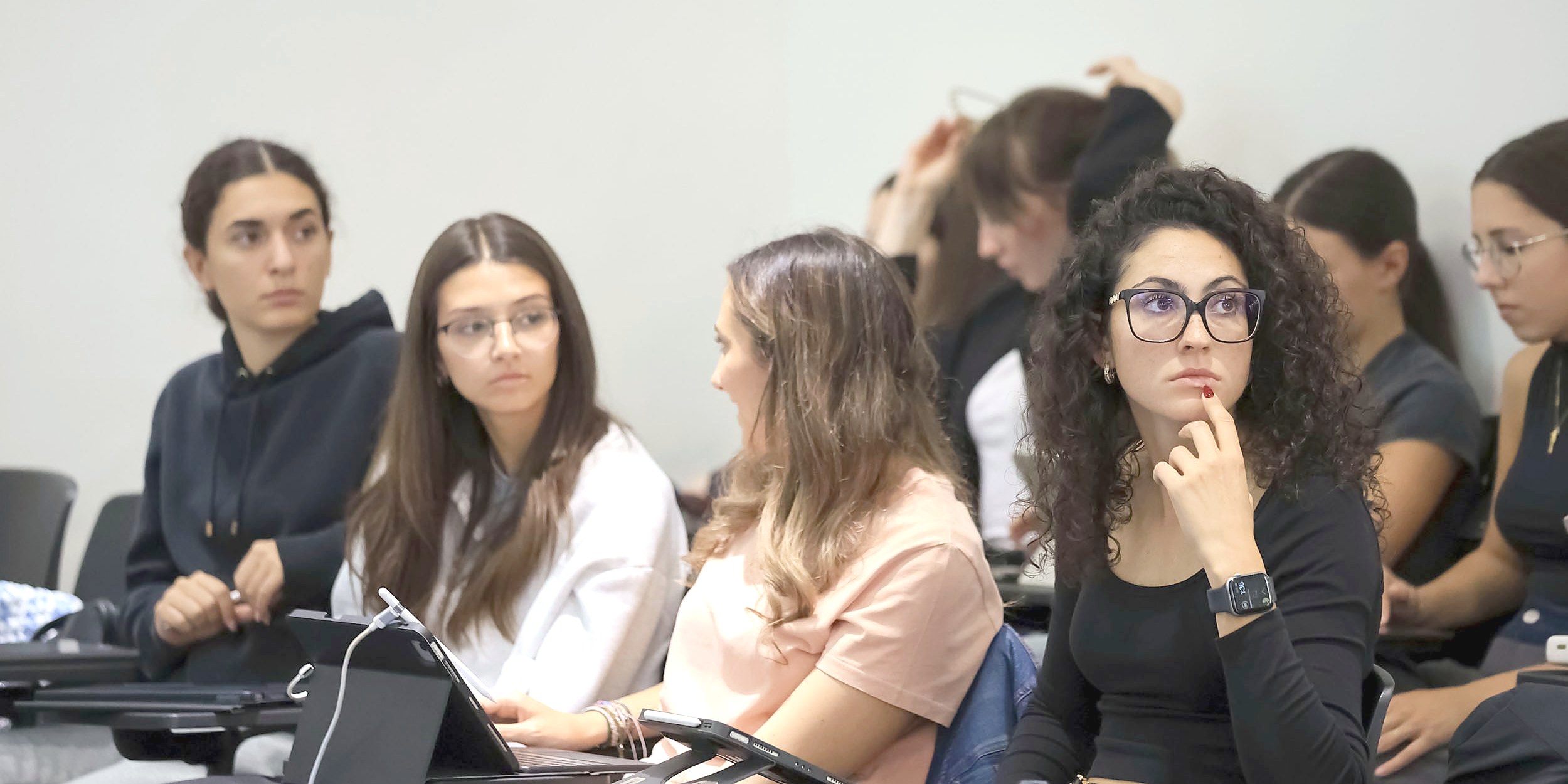 Students following a lecture on the Turin campus