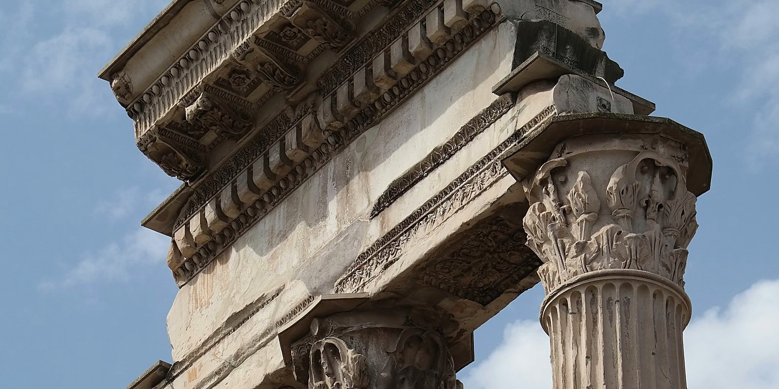 Corinthian columns and architrave of a Roman temple in the Forum