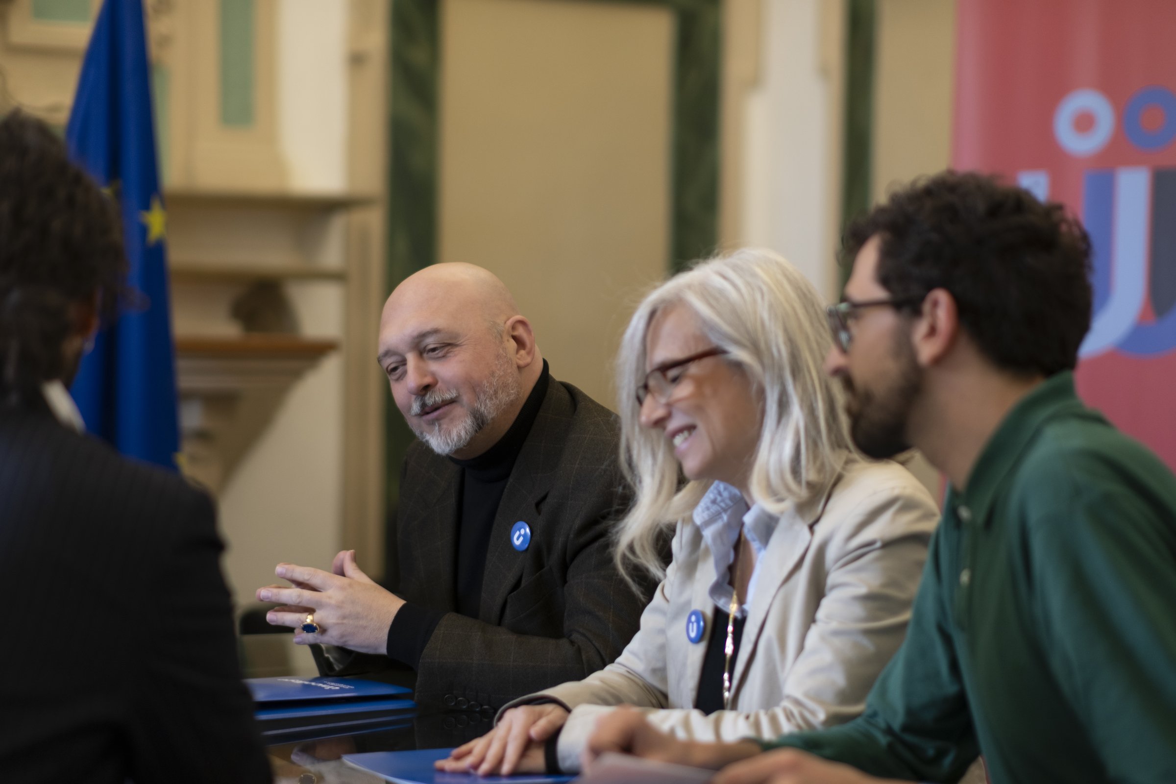 The Unicollege international office team in conversation at the meeting table