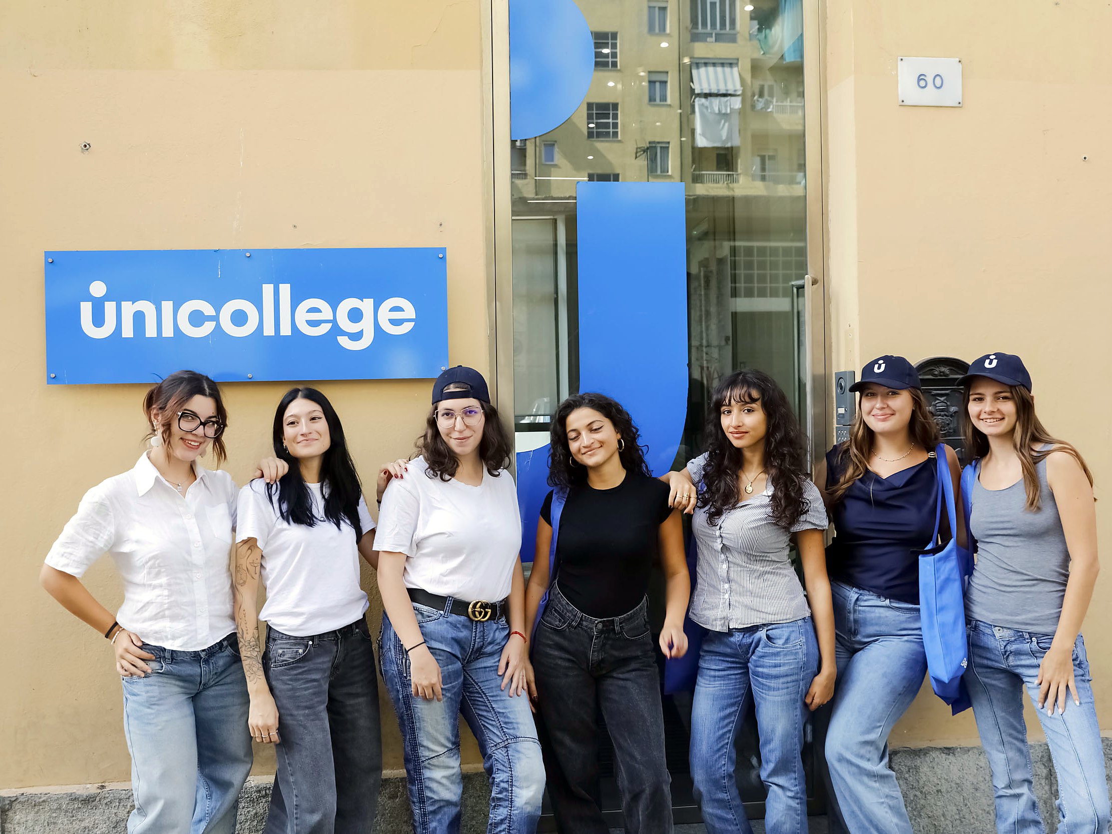 Students at the entrance of the Unicollege campus in Turin, Via Saluzzo