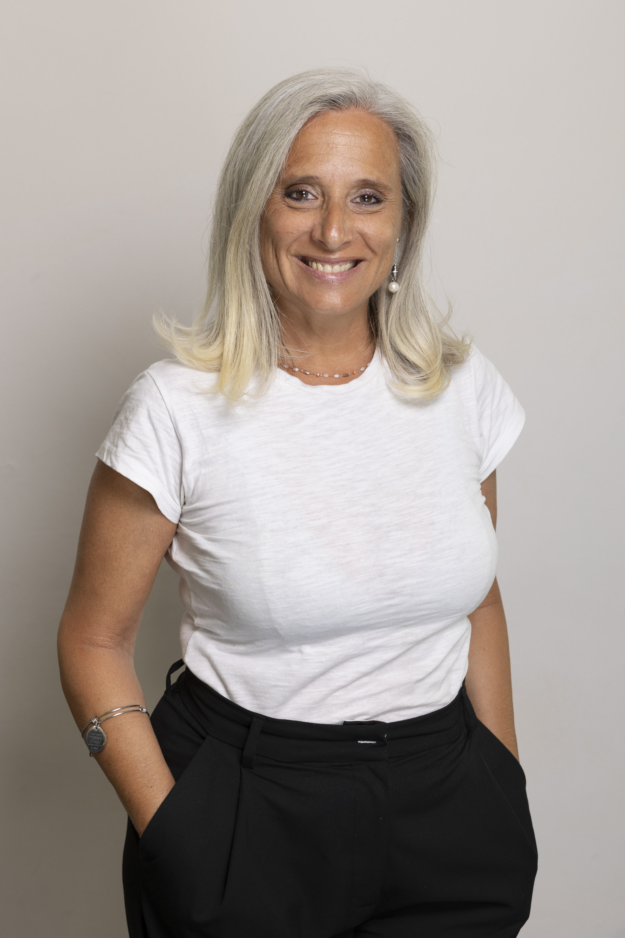 Student reading a book in a quiet campus area